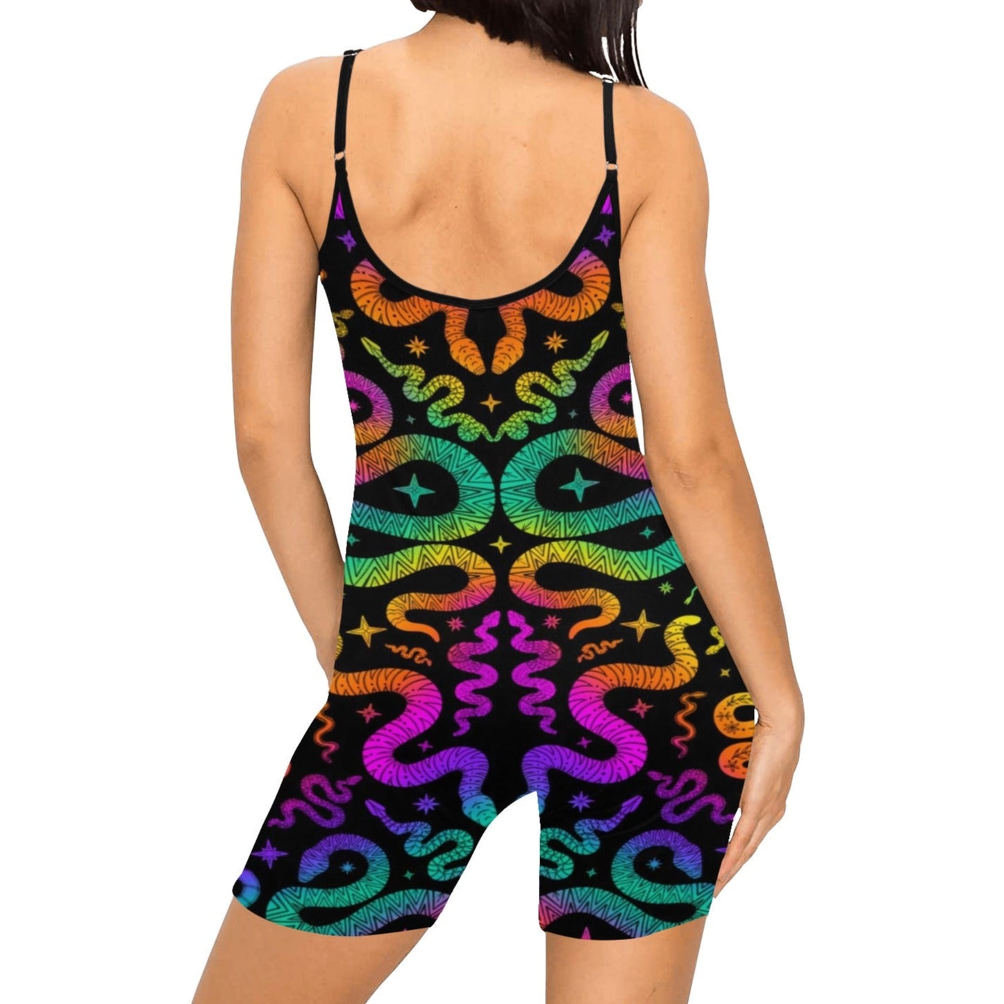 Multicolored snake patterned romper on a white background