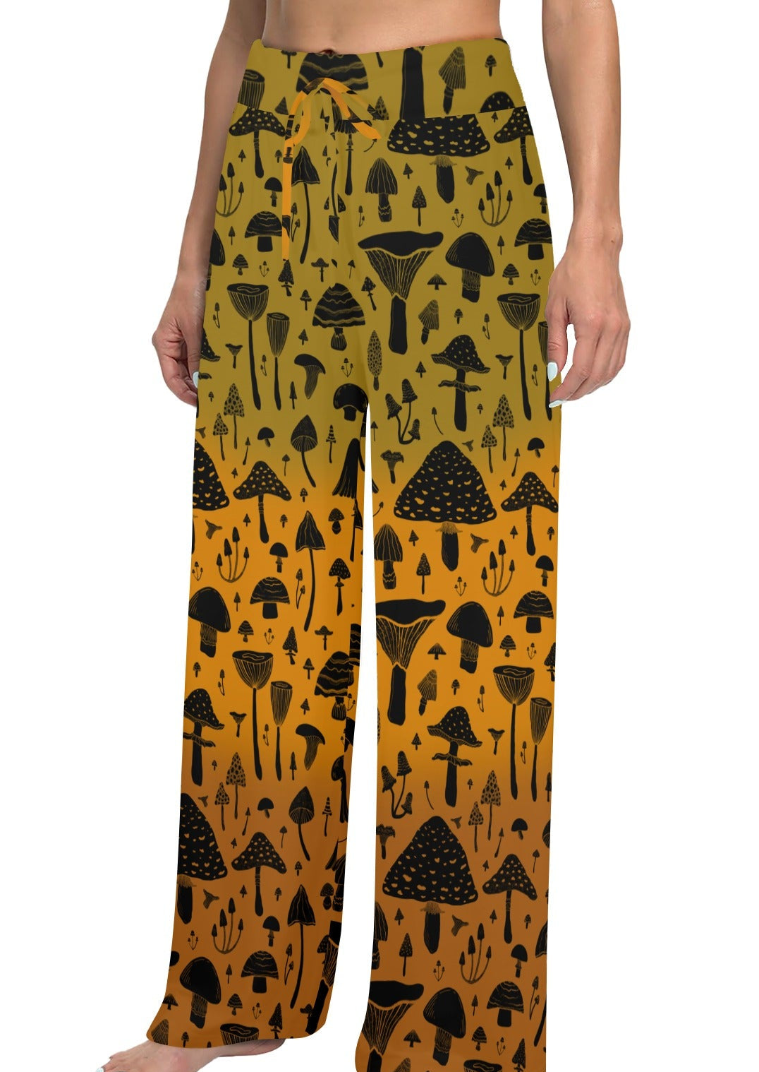 Yellow pants with black mushroom pattern worn by a person, with inset showing fit and comfort details.