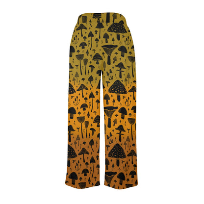 Pants with black mushroom pattern on a mustard yellow background