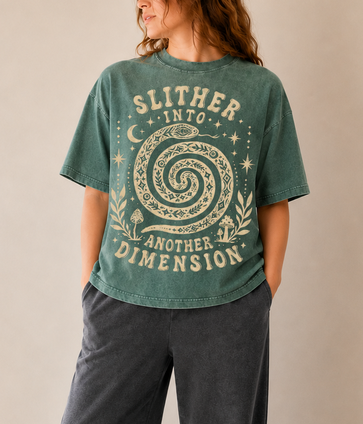 Person wearing a green t-shirt with a graphic design and text, standing in a well-lit room.